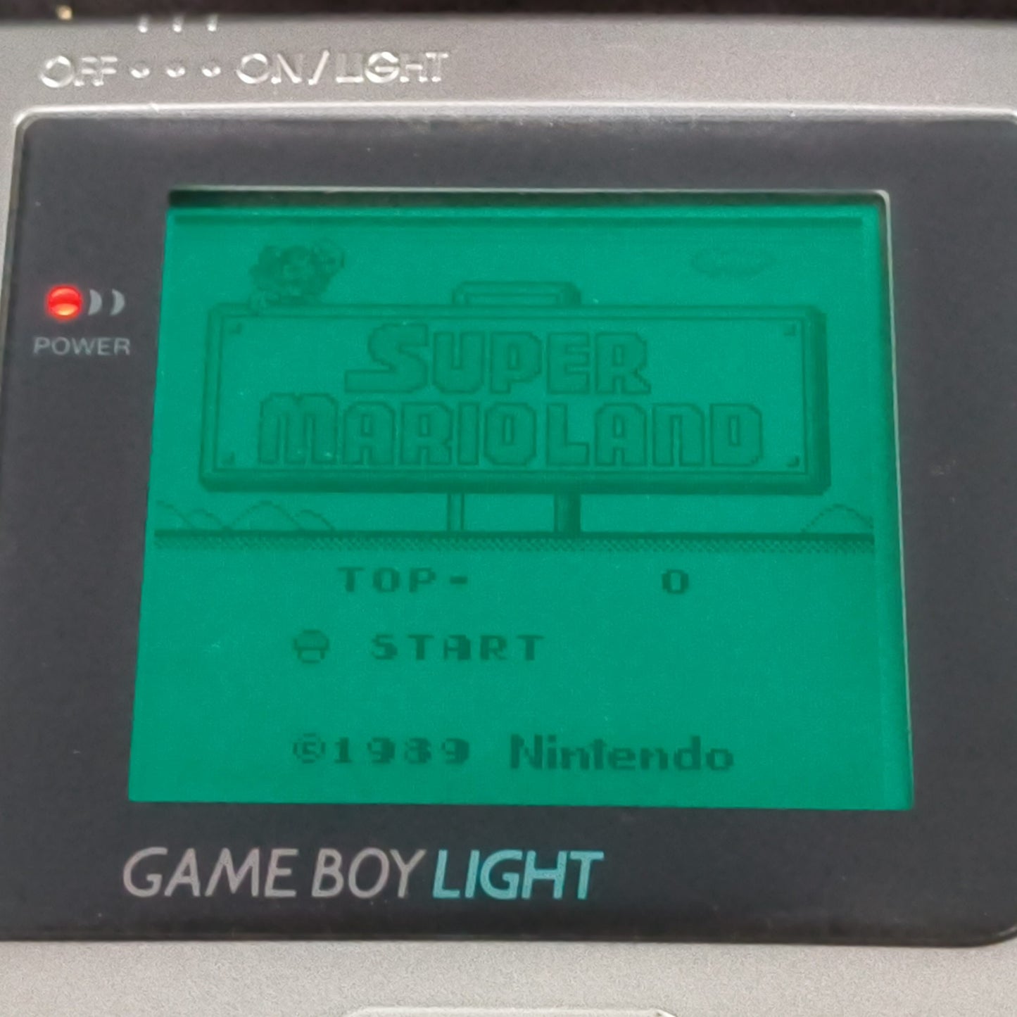 Used, Nintendo Gameboy Light Silver color console MGB-101 and Game set, Working