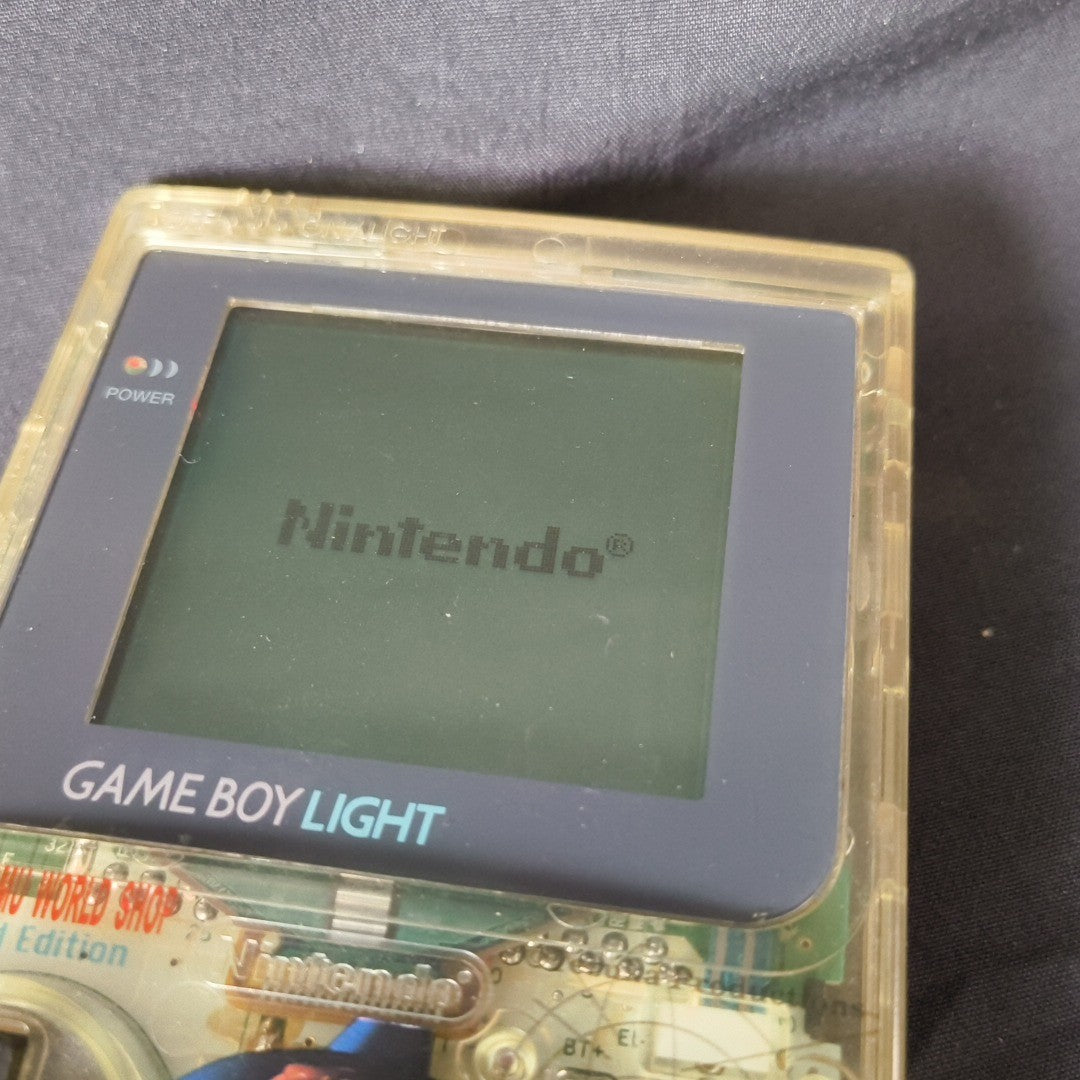 Game Boy Light Astro Boy Clear Limited edition Console Works Missing Battery Lid
