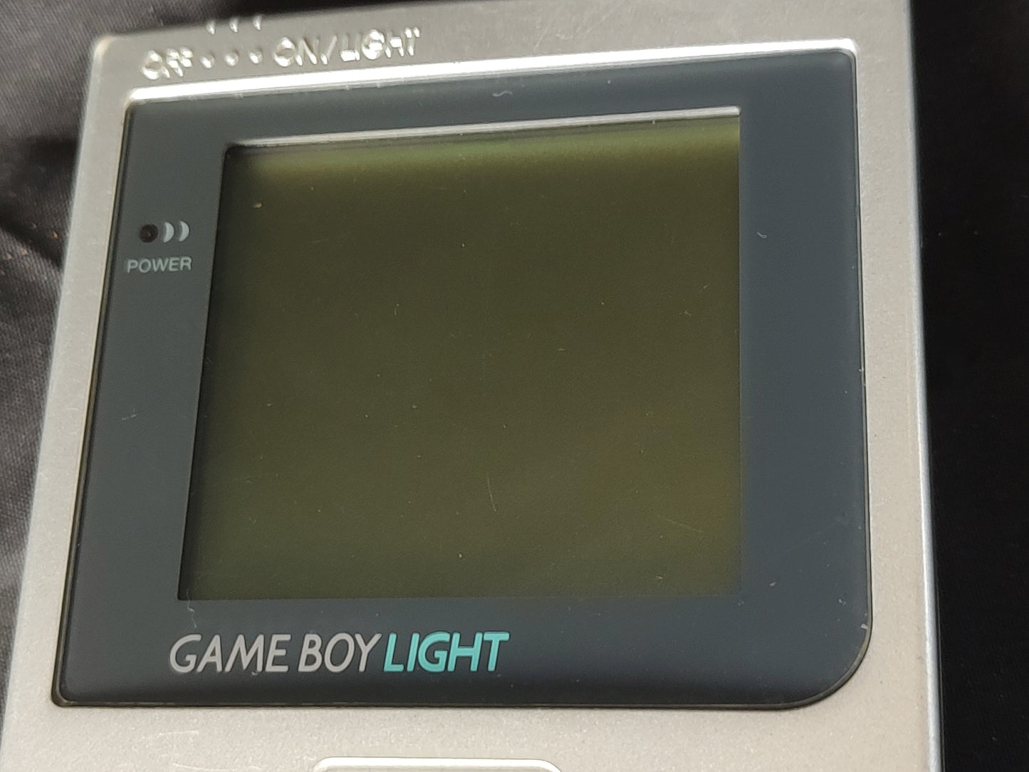 Nintendo Gameboy Light silver color console HGB-101, working -g0301-