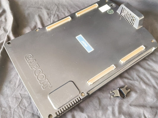 Carte Mère Capcom CPS2, étiquette verte édition japan | UK Carte Mère Capcom CPS2, étiquette verte édition japan | UK